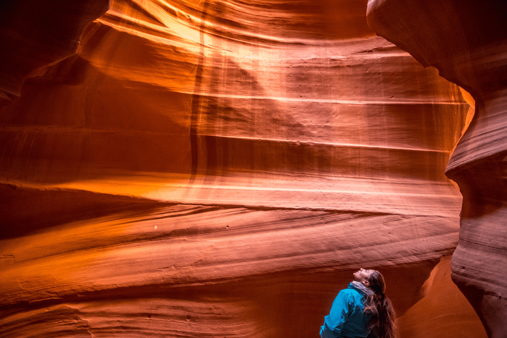 Hiker in canyon, perhaps considering outdoor program risk management or safety considerations